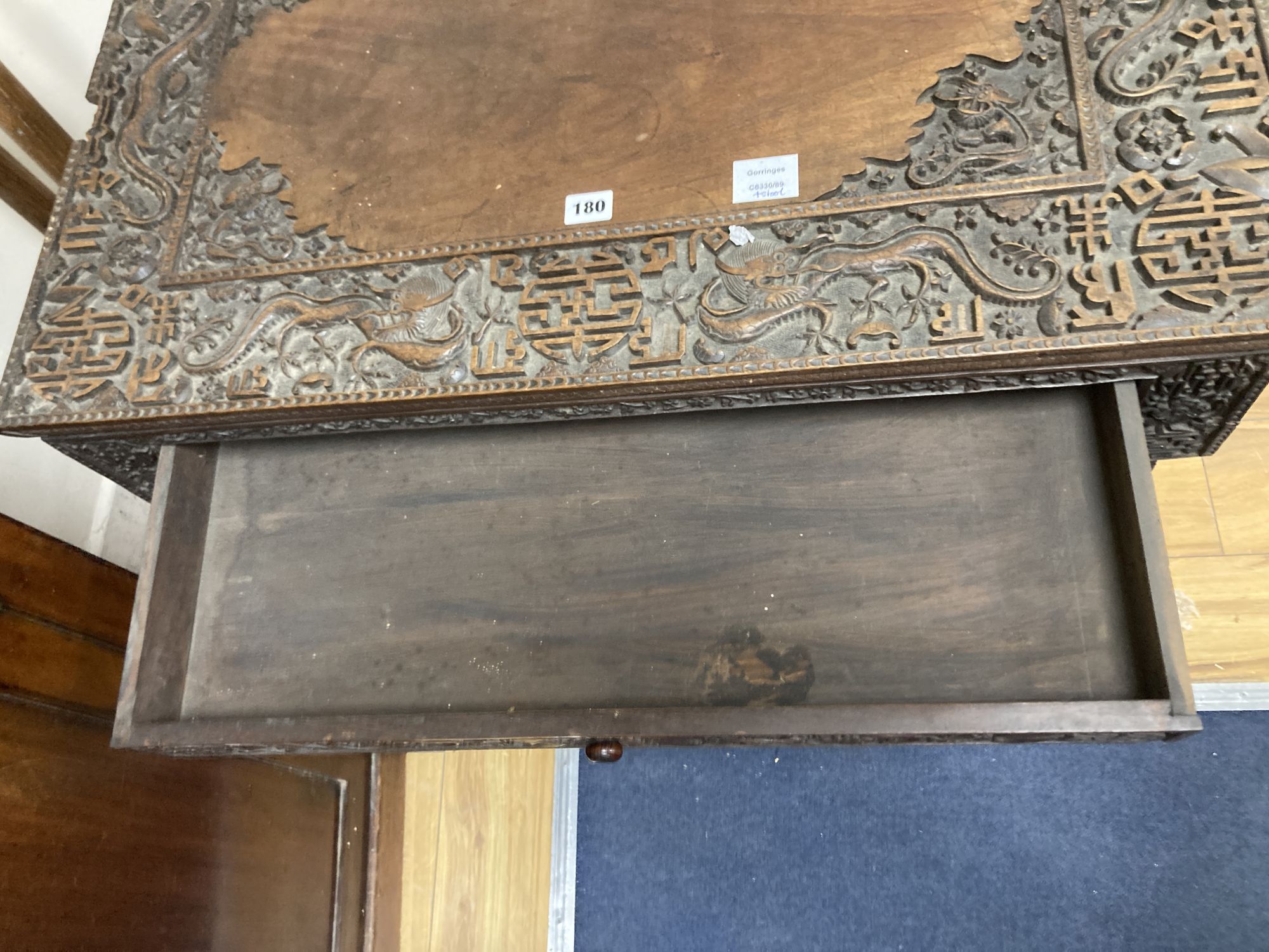 A Chinese carved hongmu folding table, width 83cm depth 56cm height 67cm, and a similar stool/stand, early 20th century
